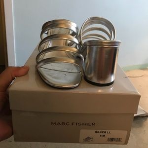 Silver Marc Fisher block heel strap sandals.